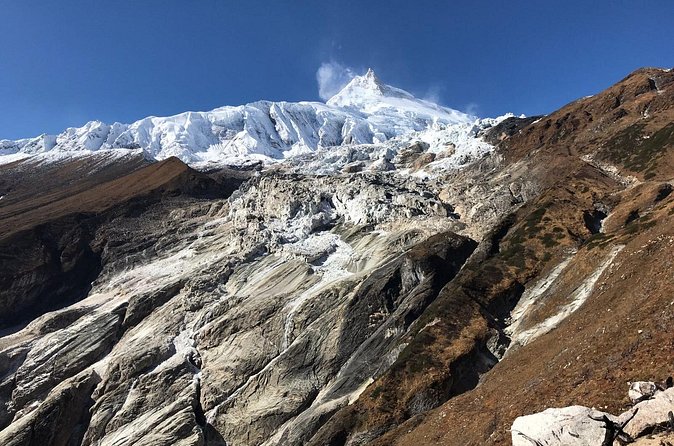 Manaslu Circuit Trek 13 Days - The Larkya La push on days 9 and 10: Larkya Bazaar, Dharamsala, and pass-time glaciers